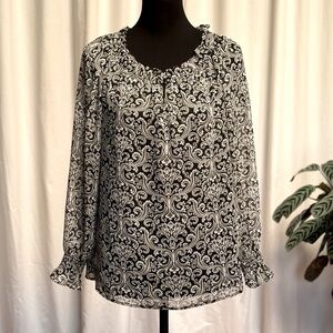 Talbots long sleeve top. Black and white sheer fabric over black. Size small.